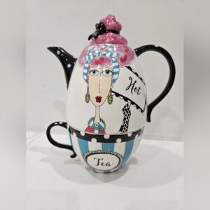 Porcelain hot tea lady teapot with one cup. Dollymama's design by joey heiberg.